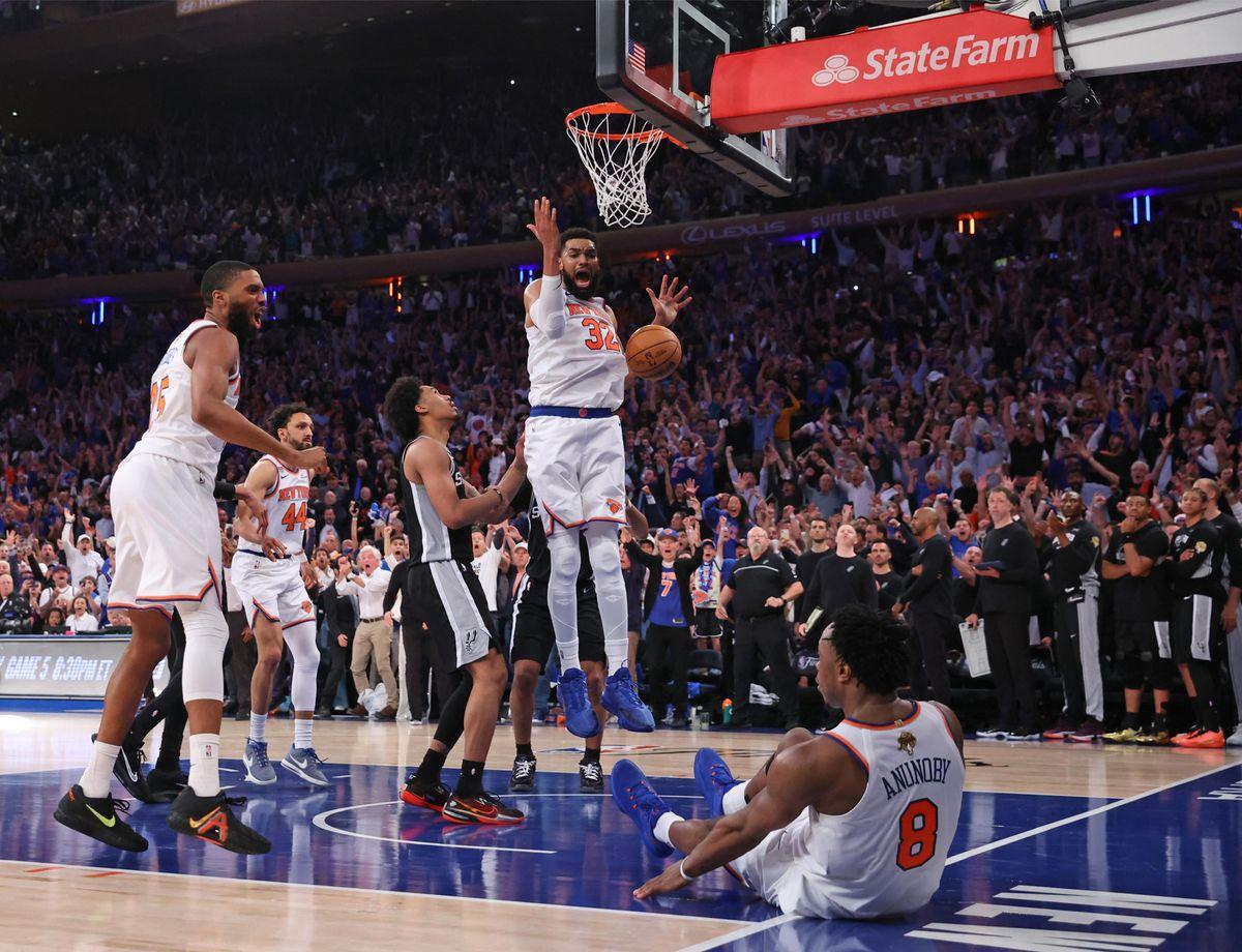 Celebrities turn out for Game 4: New York Knicks vs. San Antonio Spurs at Madison Square Garden, *NO NEW YORK DAILY NEWS, NO NEW YORK TIMES, NO NEWSDAY*. 11 Jun 2026 Pictured: Game 4: New York Knicks vs. San Antonio Spurs at Madison Square Garden - New York Knicks forward Og Anunoby #8, falls to the floor after scoring the game winning basket with a put back as New York Knicks center Karl-Anthony Towns #32, watches the ball go through the net in the 4th quarter. Photo credit: Charles Wenzelberg/New York Post / MEGA TheMegaAgency.com sales@mega.global
